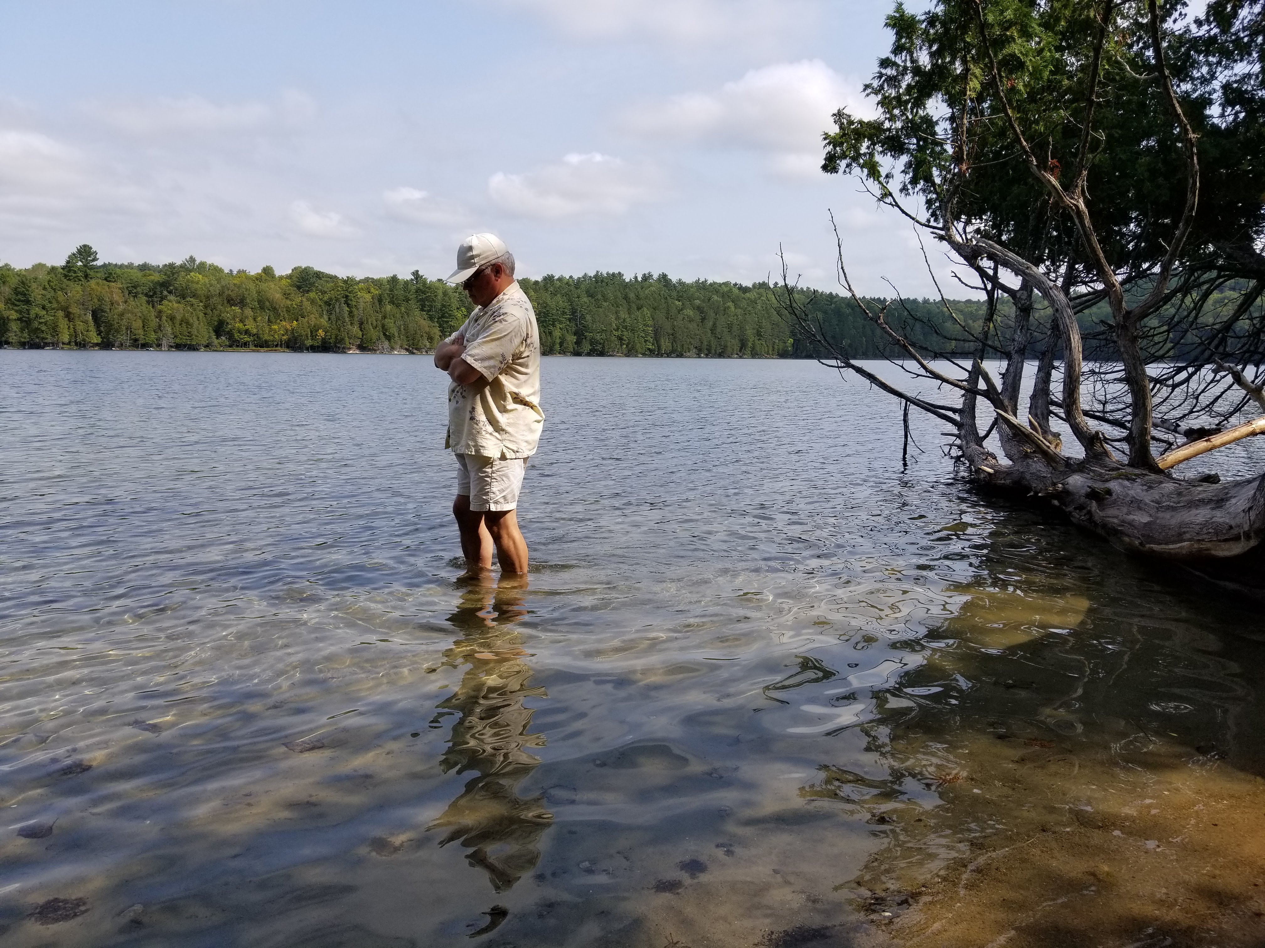 Arthur at a Canadian lake, contemplative